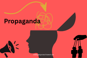 Roter Hintergrund mit schwarzen Illustrationen: ein Megafon, ein oben offener Kopf, in den gelbes Fadengewöll kommt, rechts Marionetten. Text: Propaganda. www.gespraechswert.de